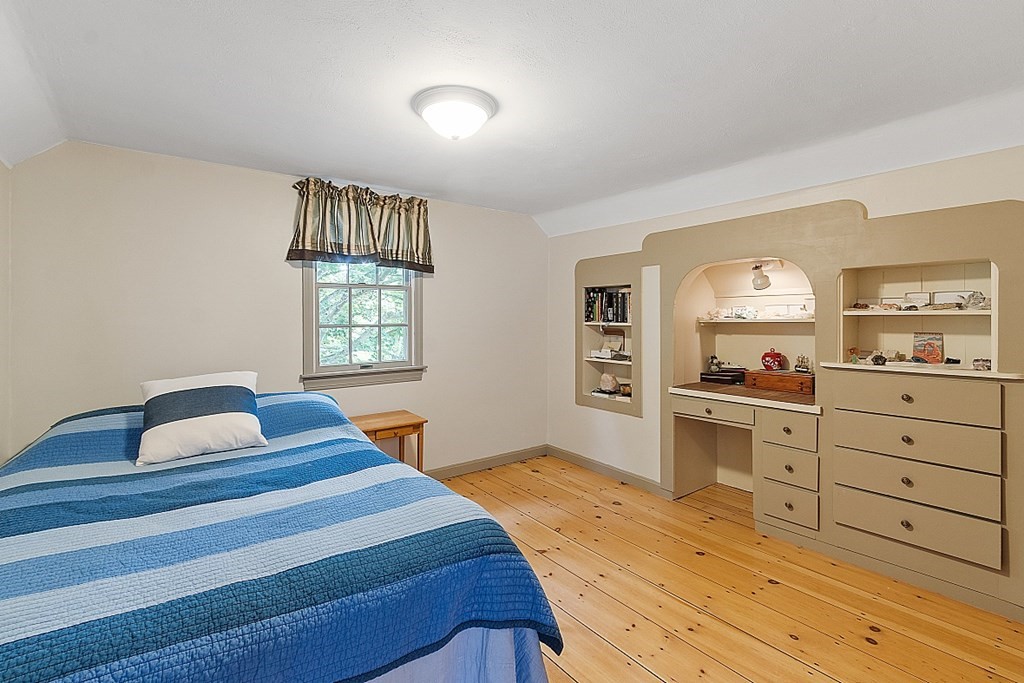 113 Green Road Bolton, MA 01740 - Photo 26 of 41 a bedroom with a bed and a dresser