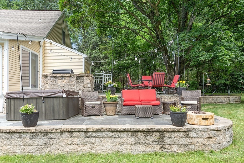 113 Green Road Bolton, MA 01740 - Photo 35 of 41 a backyard of a house with seating space