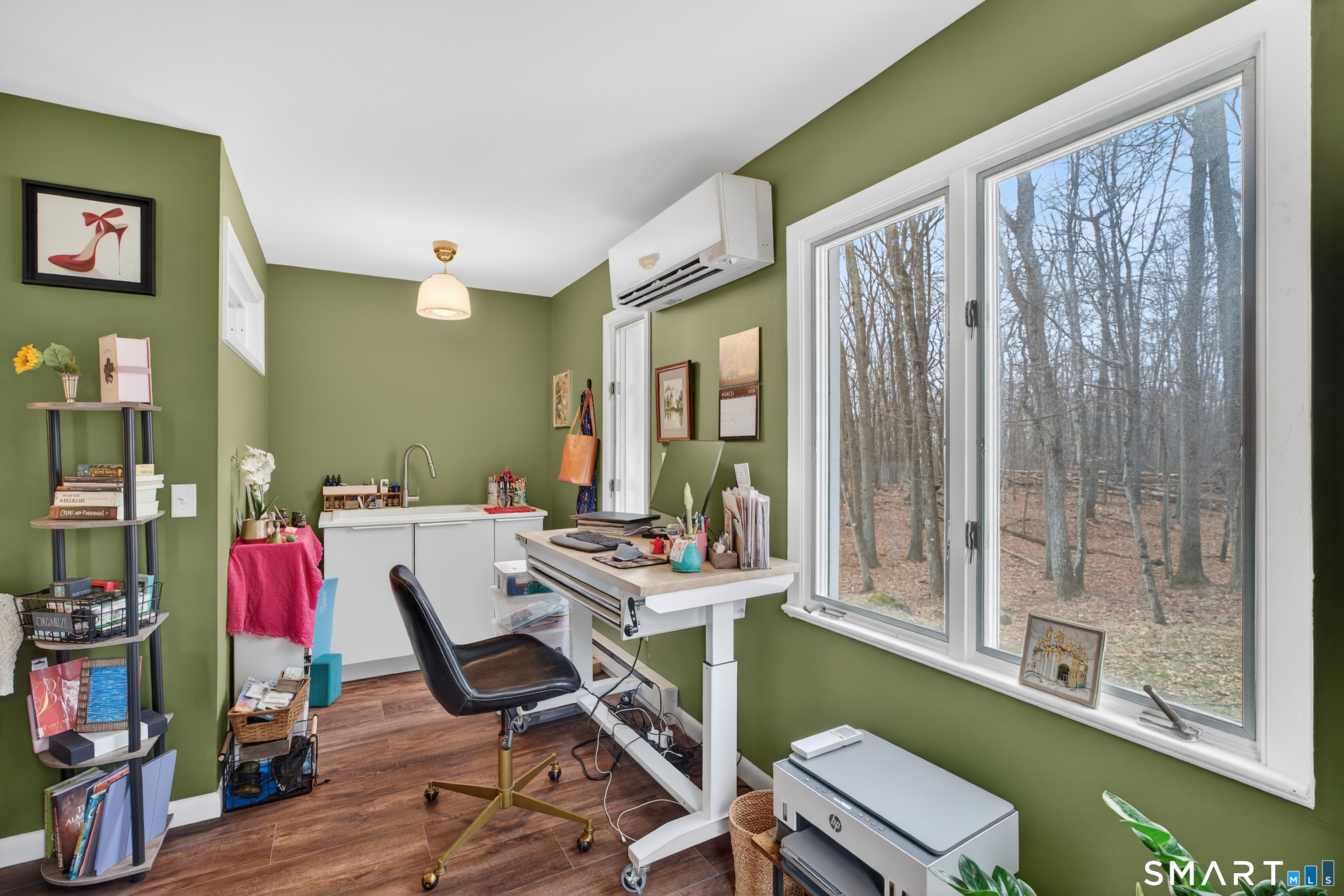 230 Six Rod Highway Hamden, CT 06518 - Photo 11 of 38 a view of a workspace with furniture and a window