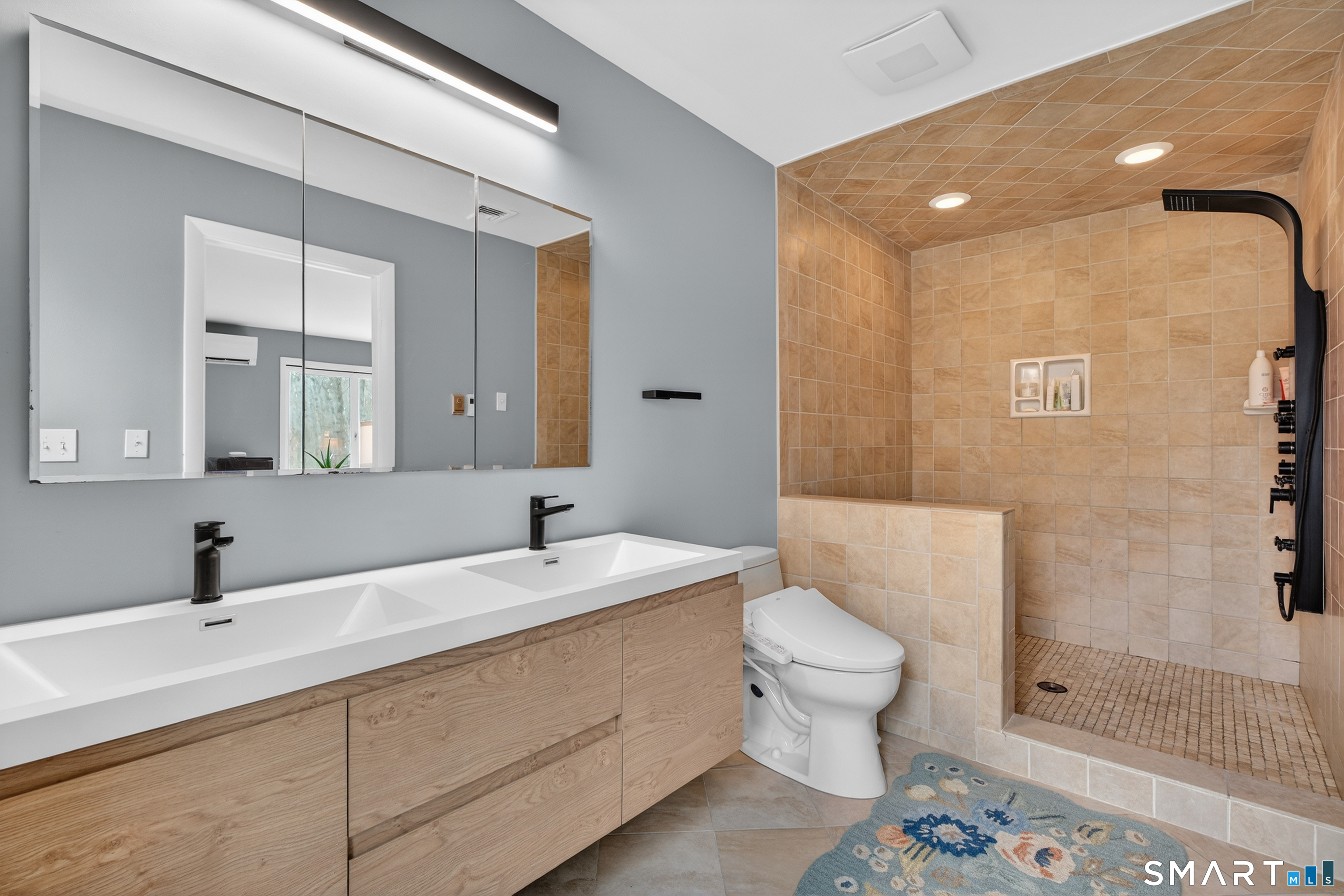 230 Six Rod Highway Hamden, CT 06518 - Photo 20 of 38 a bathroom with a double vanity sink toilet mirror and shower