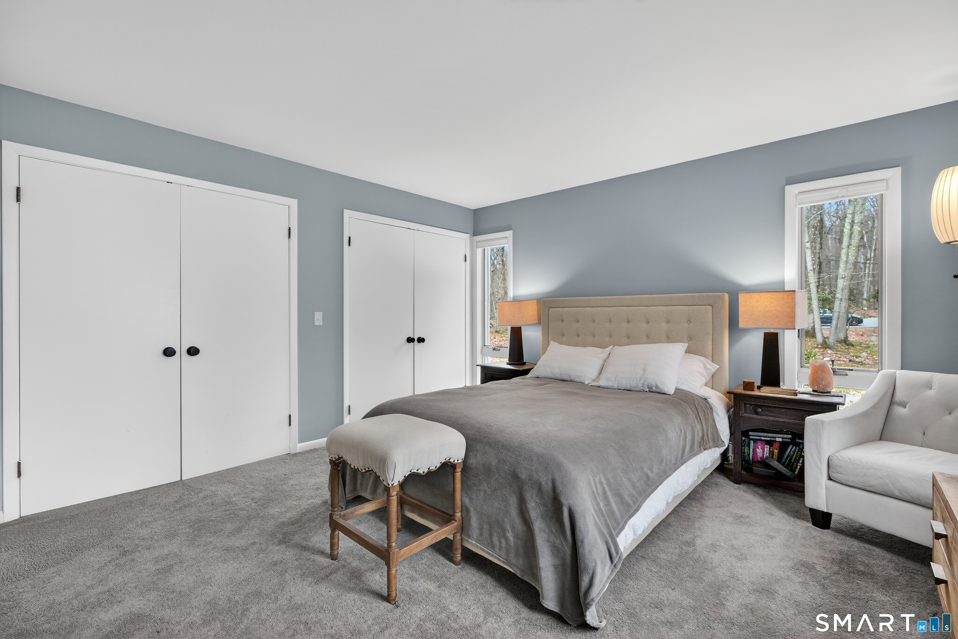 230 Six Rod Highway Hamden, CT 06518 - Photo 21 of 38 a bedroom with a bed and a couch
