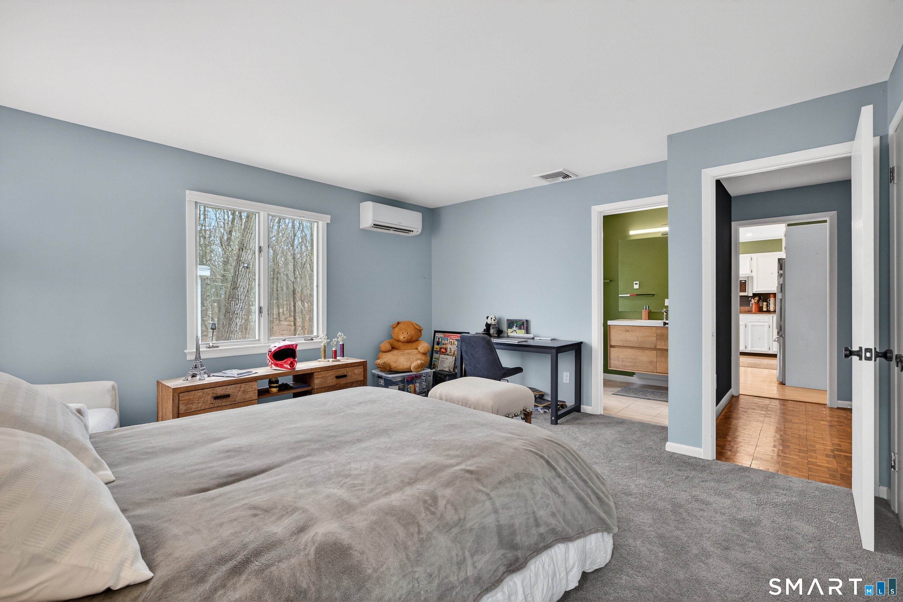 230 Six Rod Highway Hamden, CT 06518 - Photo 22 of 38 a bed room with a bed and a large window