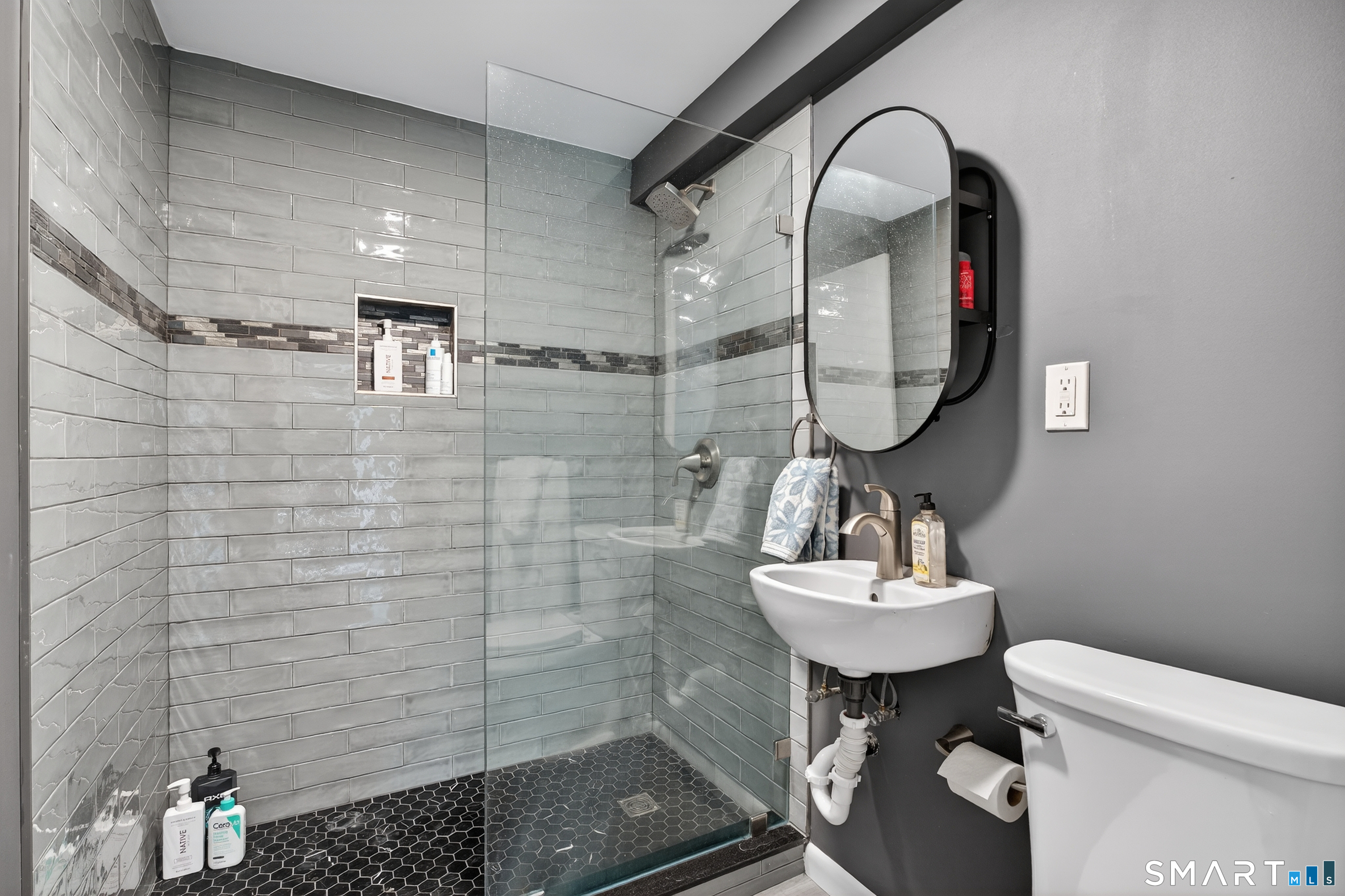 230 Six Rod Highway Hamden, CT 06518 - Photo 25 of 38 a bathroom with a sink toilet and shower