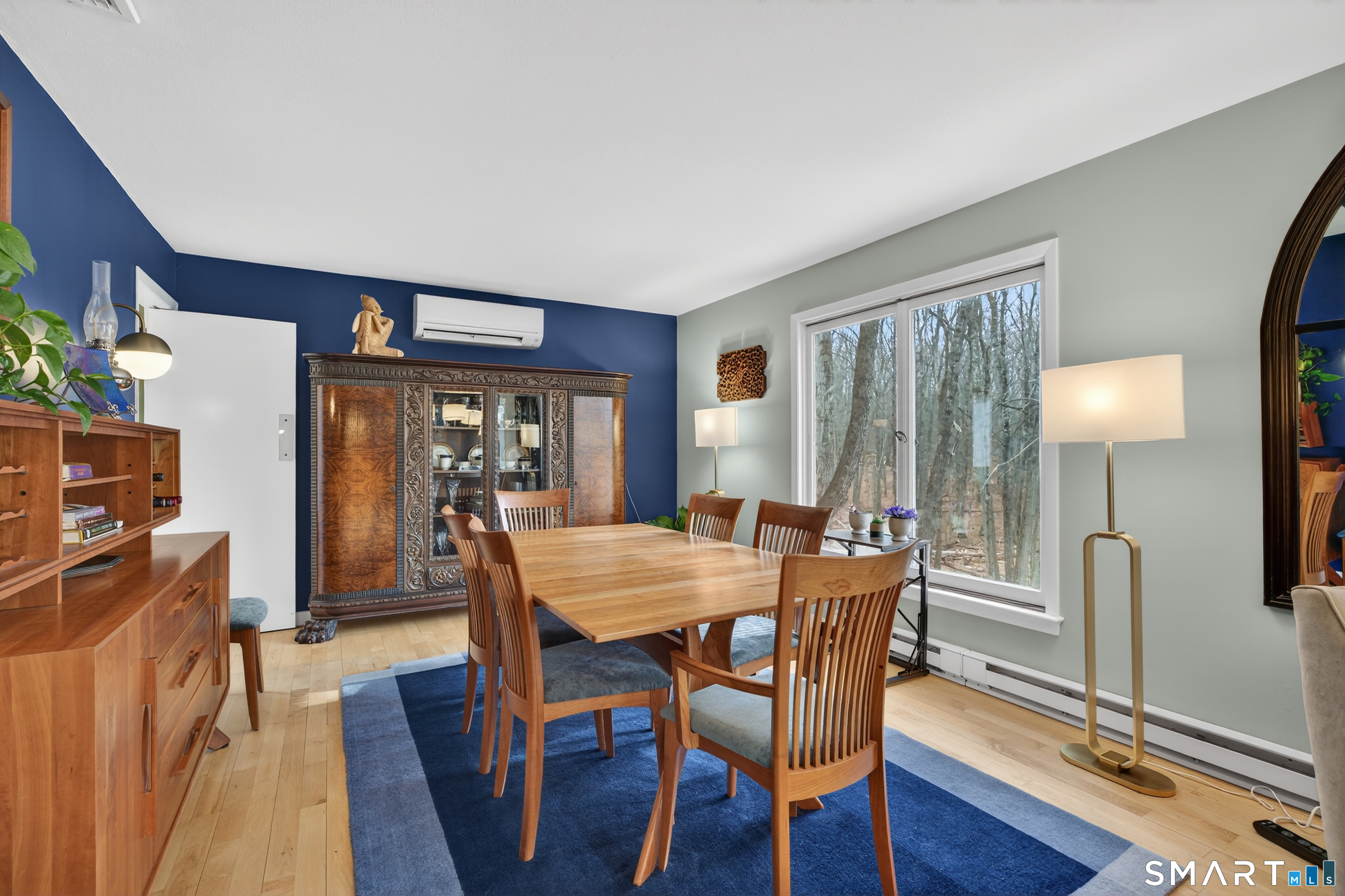 230 Six Rod Highway Hamden, CT 06518 - Photo 6 of 38 a view of a dining room with furniture window and wooden floor