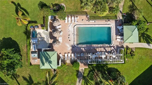 aerial view of a house with a garden