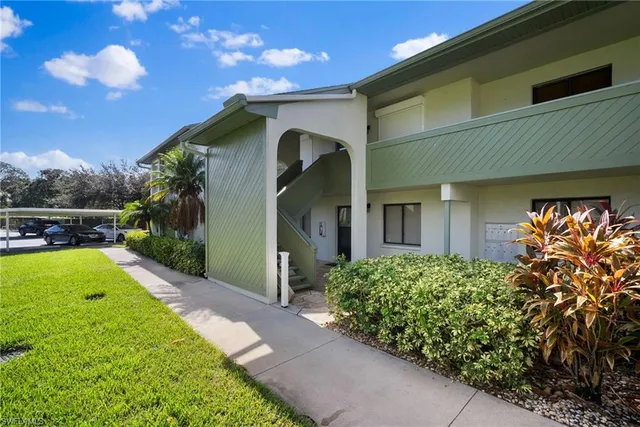 a front view of a house having yard
