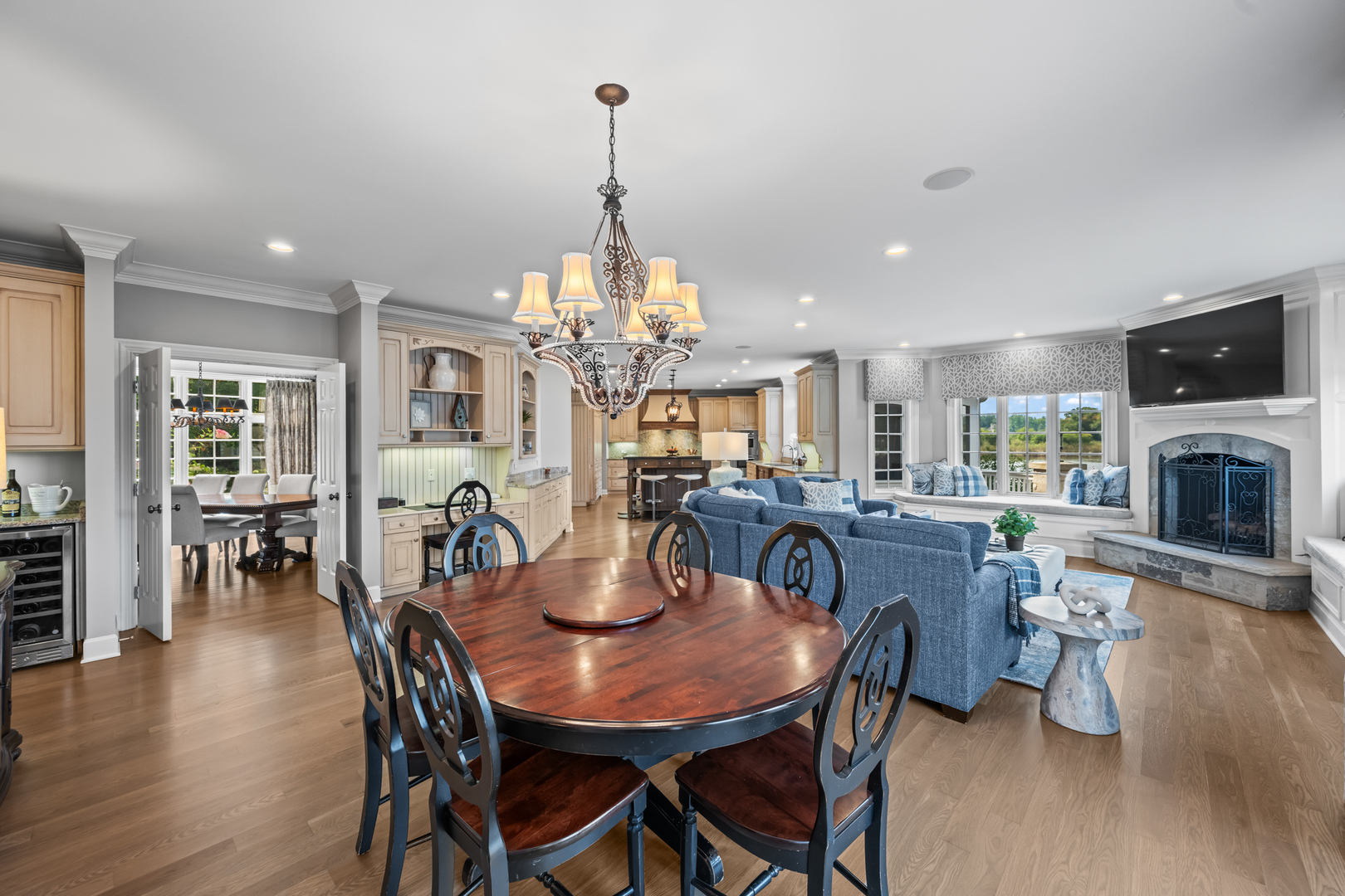 35 Riderwood Road North Barrington, IL 60010 - Photo 12 of 59 a view of a dining room and livingroom with furniture wooden floor a chandelier