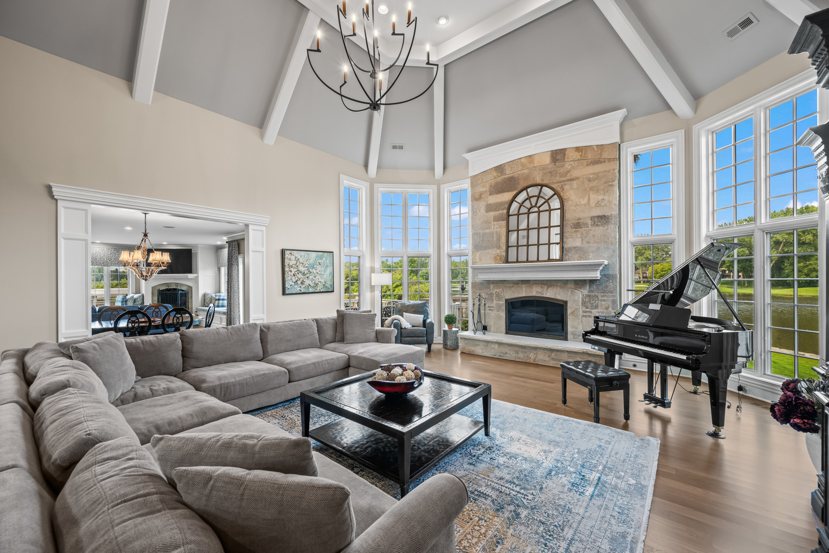 35 Riderwood Road North Barrington, IL 60010 - Photo 14 of 59 a living room with furniture a large window and a fireplace