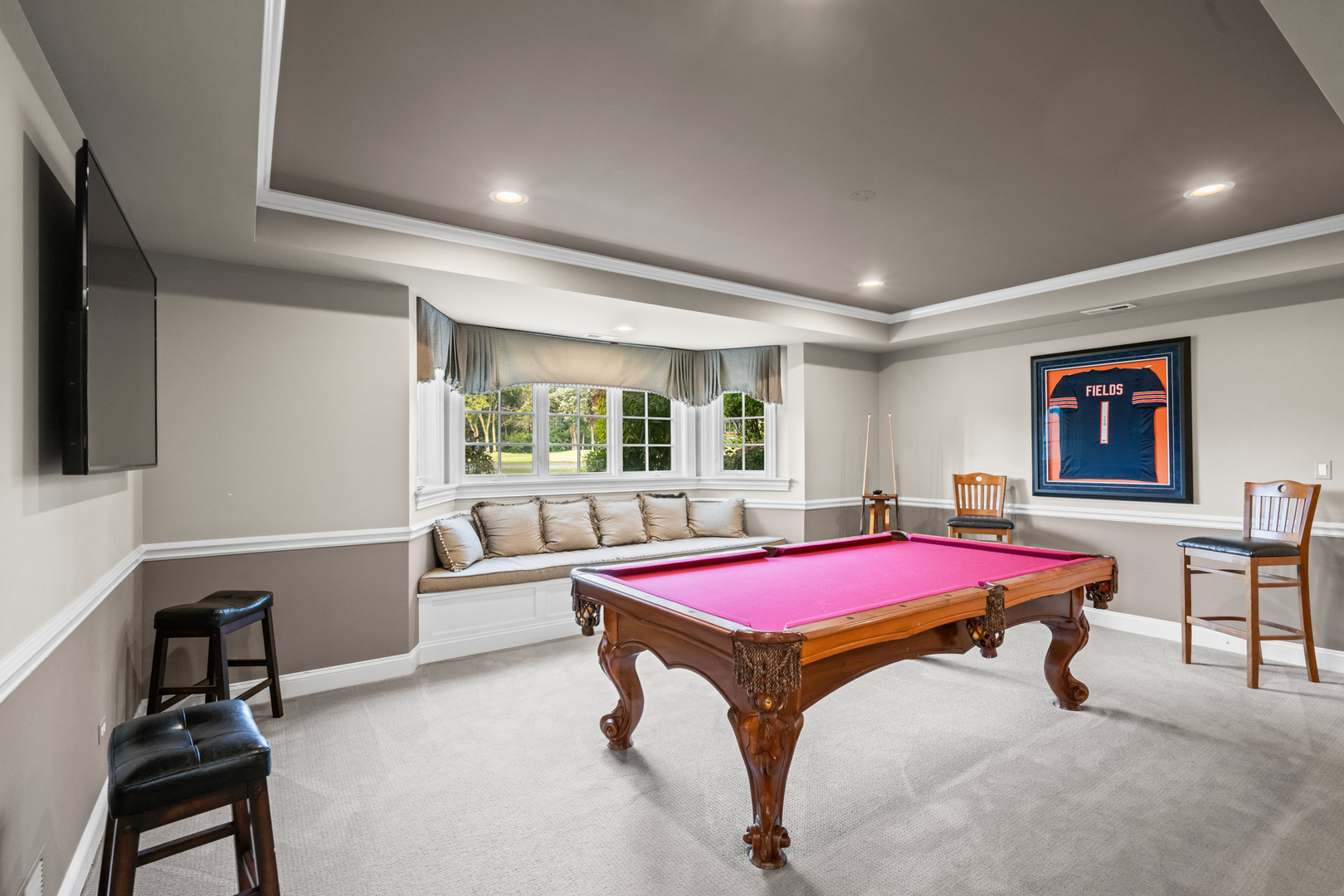 35 Riderwood Road North Barrington, IL 60010 - Photo 37 of 59 a living room with a pool table and a flat screen tv