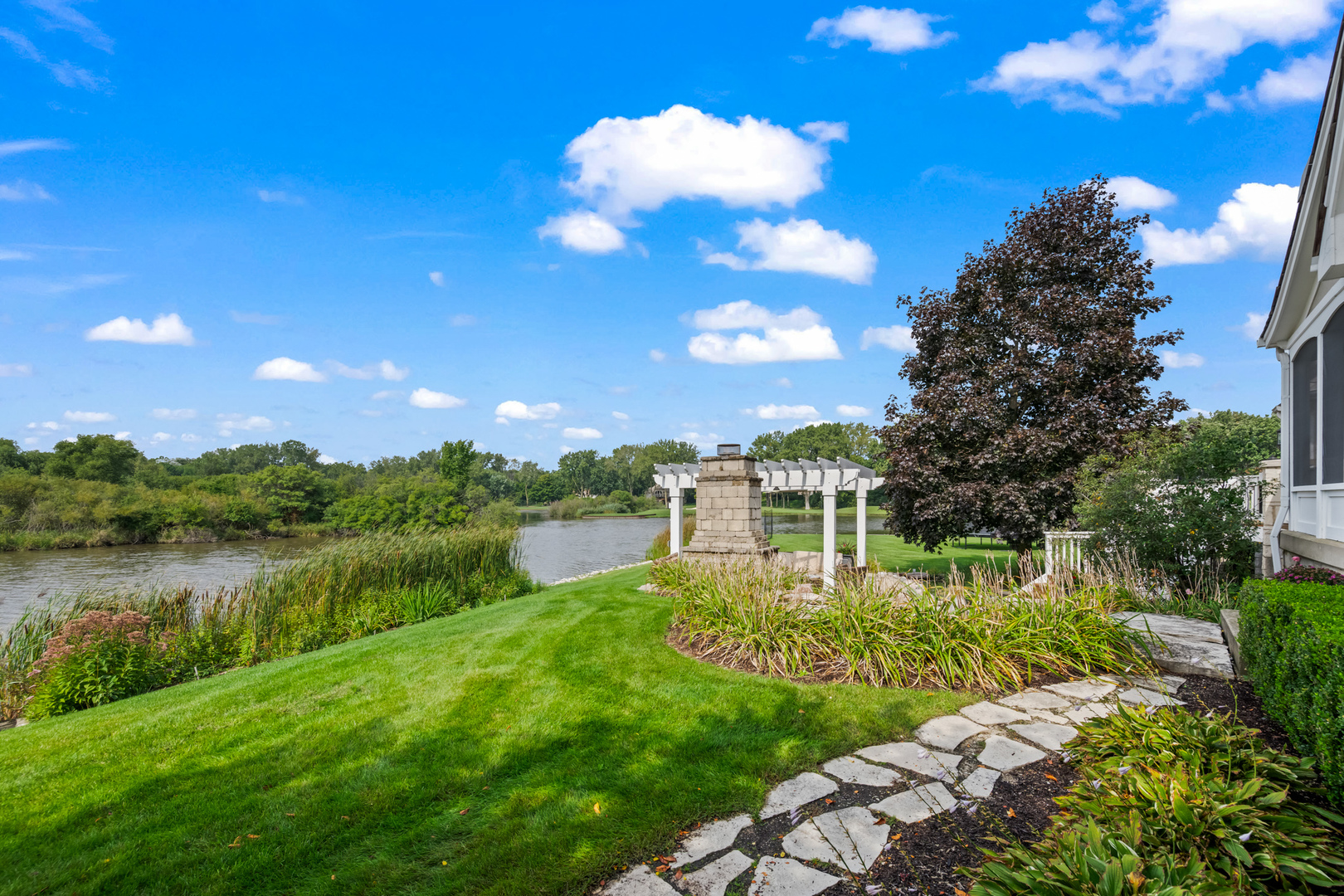 35 Riderwood Road North Barrington, IL 60010 - Photo 43 of 59 a view of a lake with a garden