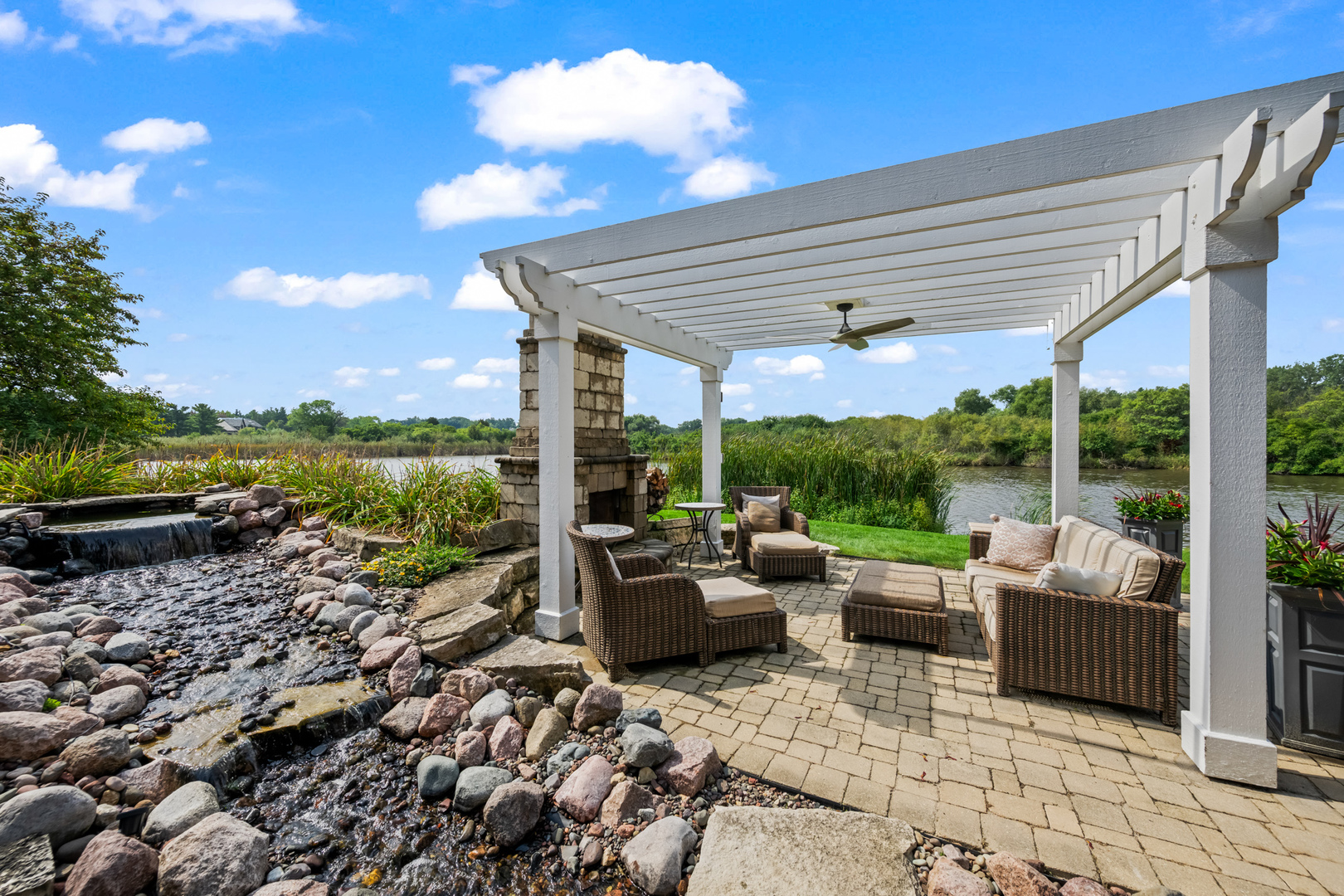 35 Riderwood Road North Barrington, IL 60010 - Photo 45 of 59 a living room with patio furniture and a yard