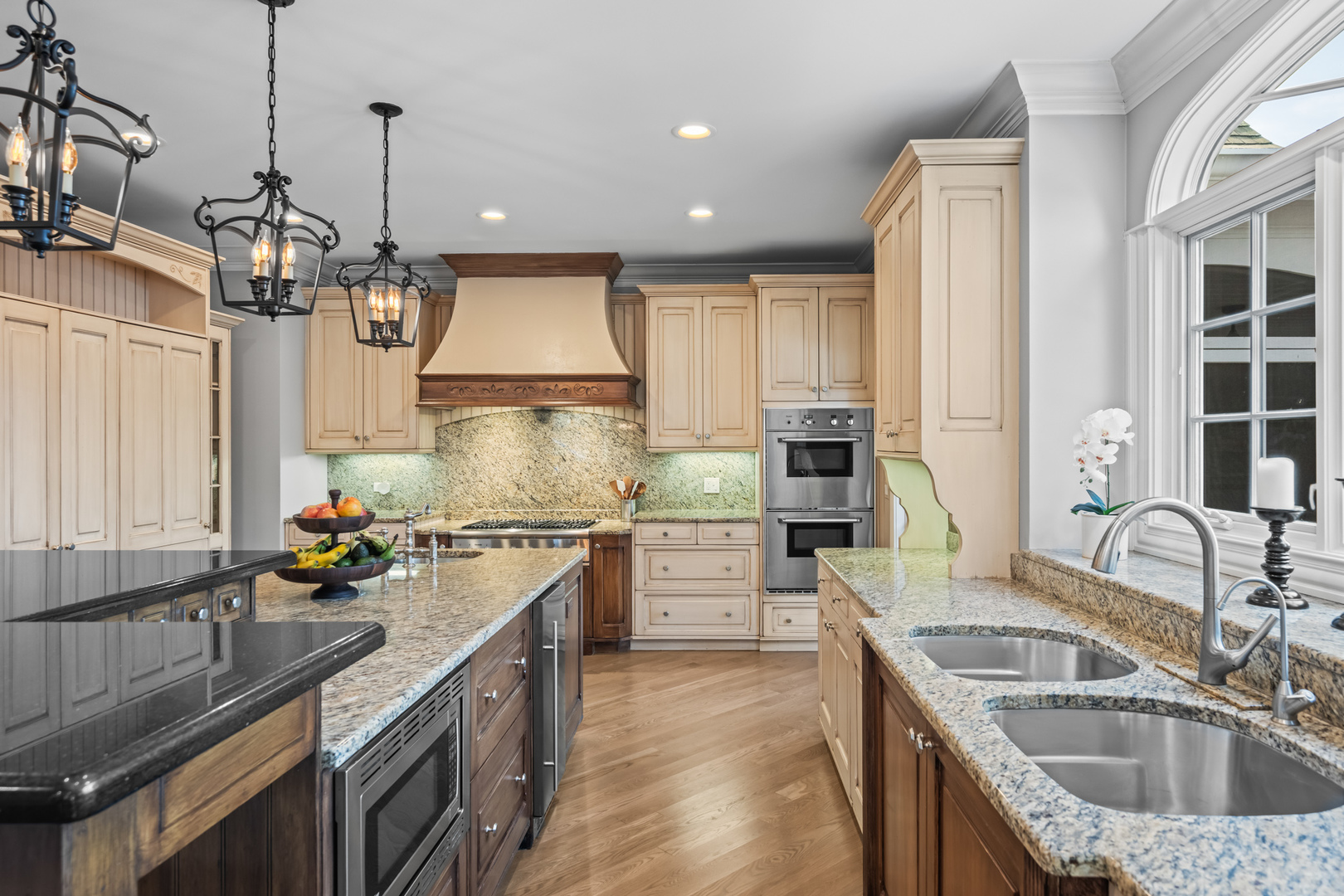 35 Riderwood Road North Barrington, IL 60010 - Photo 7 of 59 a kitchen with a sink stove a faucet and cabinets