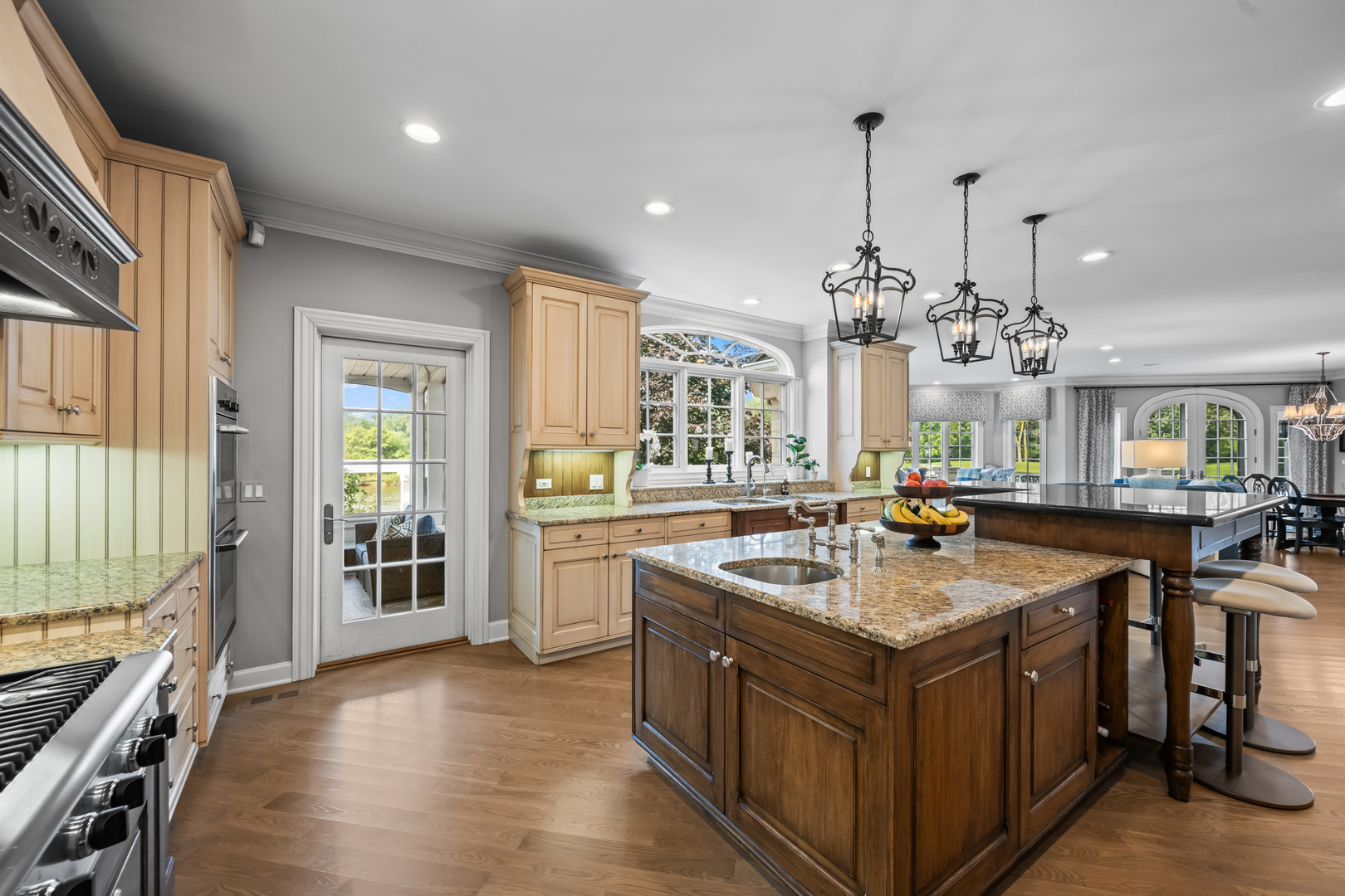 35 Riderwood Road North Barrington, IL 60010 - Photo 8 of 59 a kitchen with a stove and a wooden floor