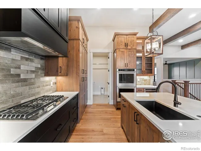a spacious bathroom with a double vanity sink and a mirror