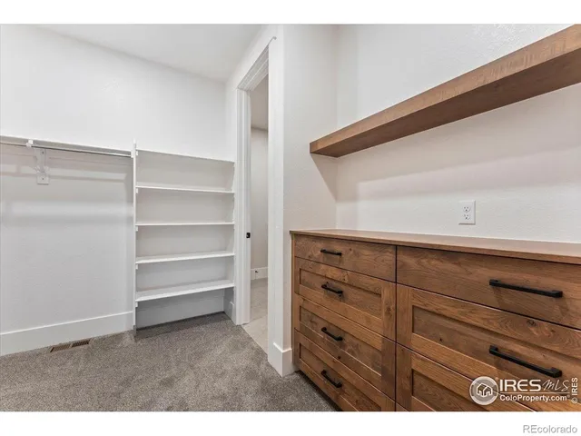 a view of a livingroom with a staircase