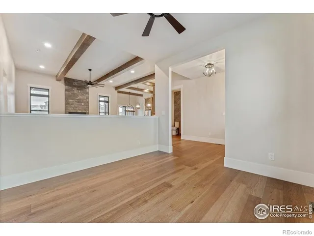 a kitchen with a counter space a sink appliances and cabinets