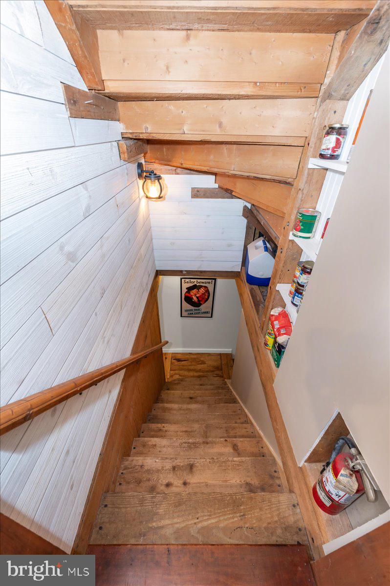16926 Sprecher Road Sharpsburg, MD 21782 - Photo 32 of 76 Charming wooden staircase invites exploration.