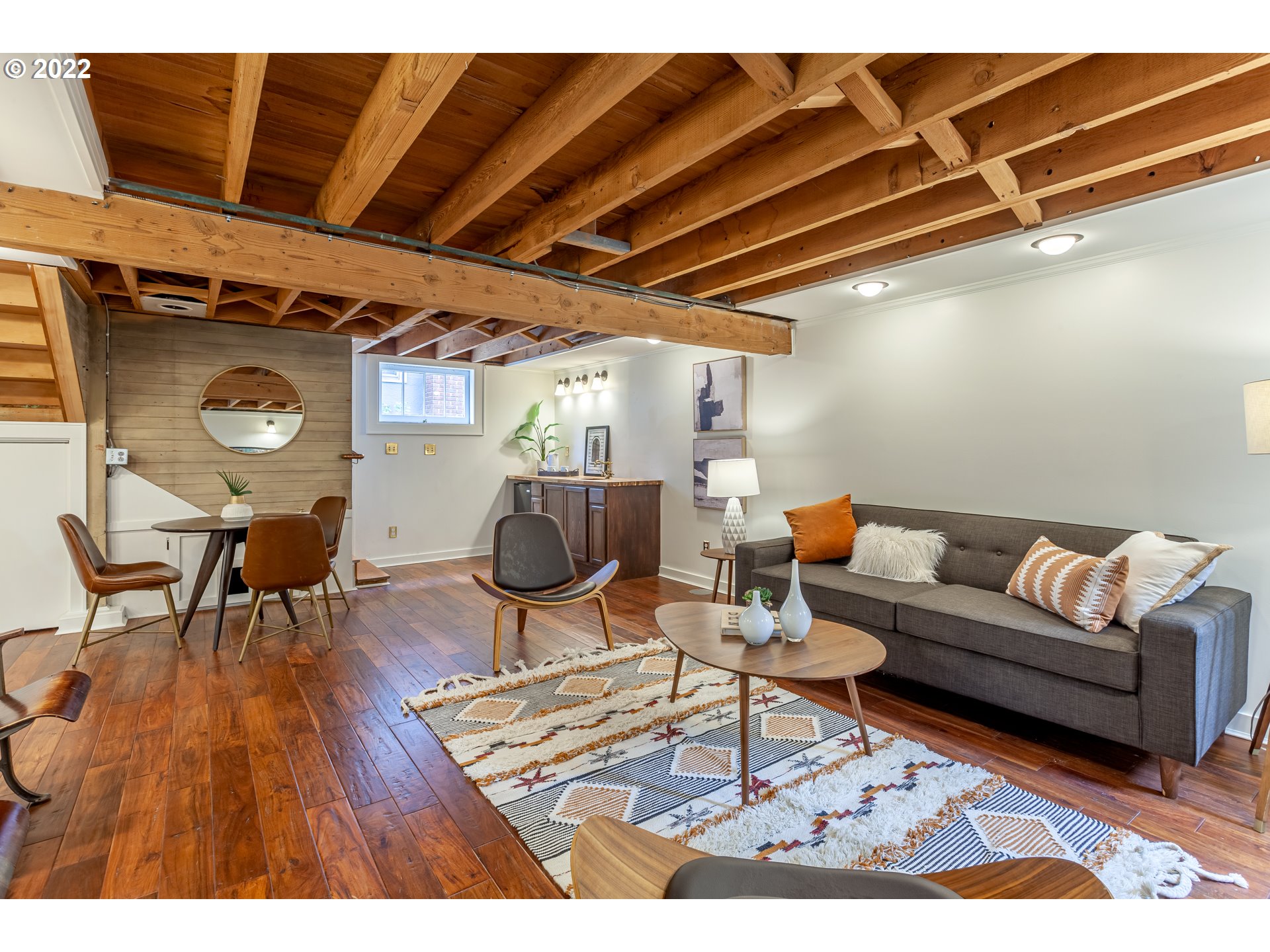 3345 Northeast Holladay Street Portland, OR 97232 - Photo 21 of 32 a living room with furniture and wooden floor