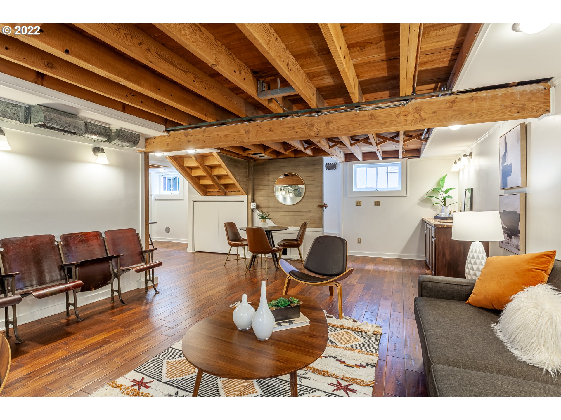 3345 Northeast Holladay Street Portland, OR 97232 - Photo 22 of 32 a living room with furniture and wooden floor