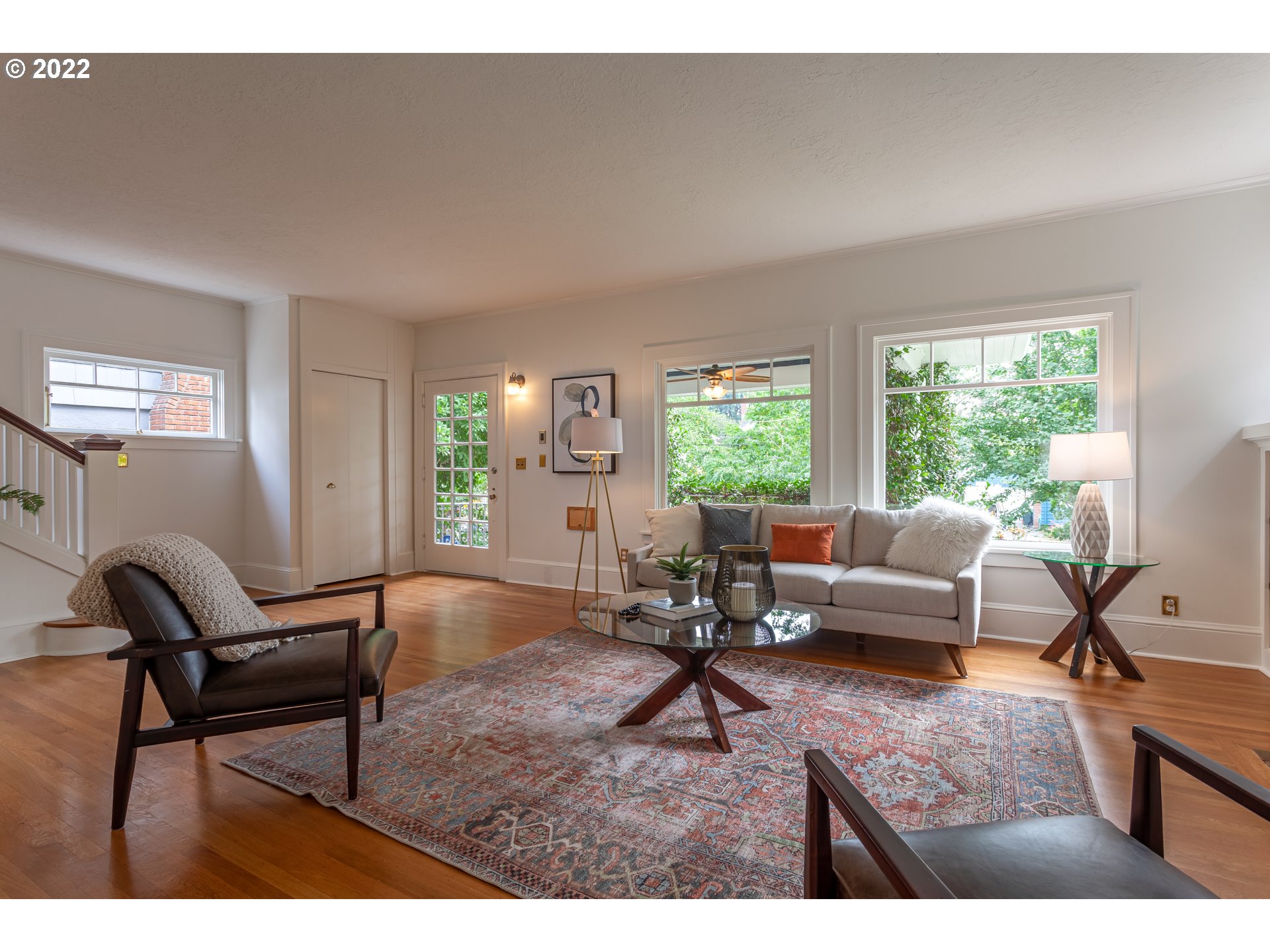 3345 Northeast Holladay Street Portland, OR 97232 - Photo 4 of 32 a living room with furniture and a large window