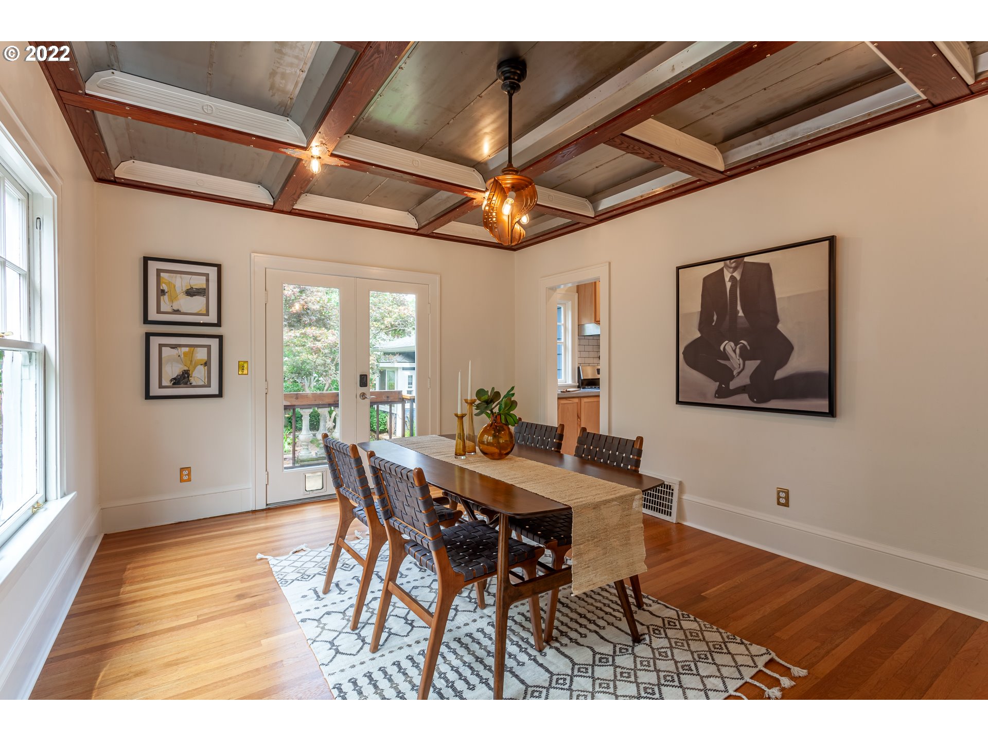 3345 Northeast Holladay Street Portland, OR 97232 - Photo 6 of 32 a view of a dining room with furniture window and wooden floor