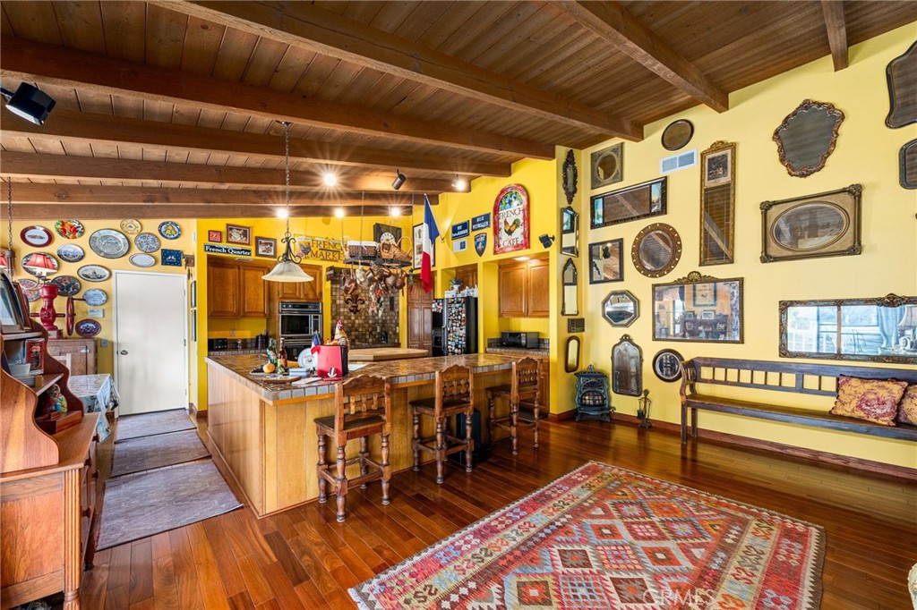 2421 Cliff Road Upland, CA 91784 - Photo 14 of 45 a view of a dining room with furniture and wooden floor