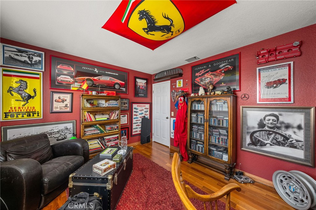 2421 Cliff Road Upland, CA 91784 - Photo 21 of 45 a reading room with furniture and book shelf