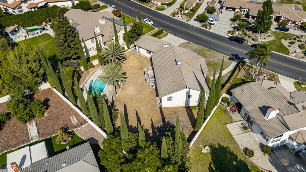 2421 Cliff Road Upland, CA 91784 - Photo 42 of 45 an aerial view of a residential apartment building with a yard