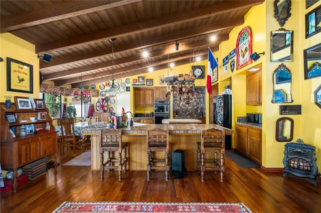 a view of a swimming pool with outdoor seating