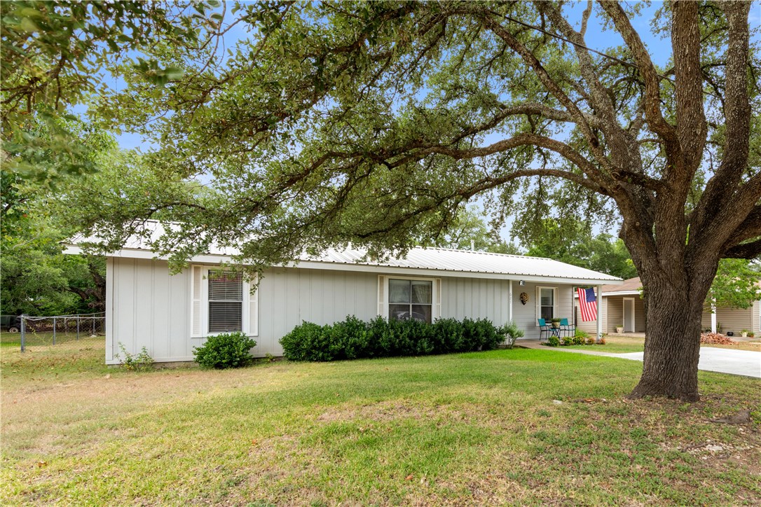 627 Brooks Mill Road Bertram, TX 78605 - Photo 1 of 1 a front view of house with yard and green space