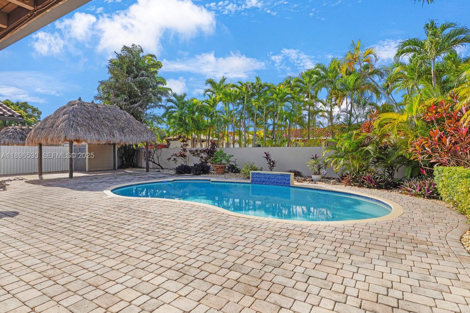 14020 Southwest 38th Street Miami, FL 33175 - Photo 21 of 21 a view of outdoor space yard and a tree