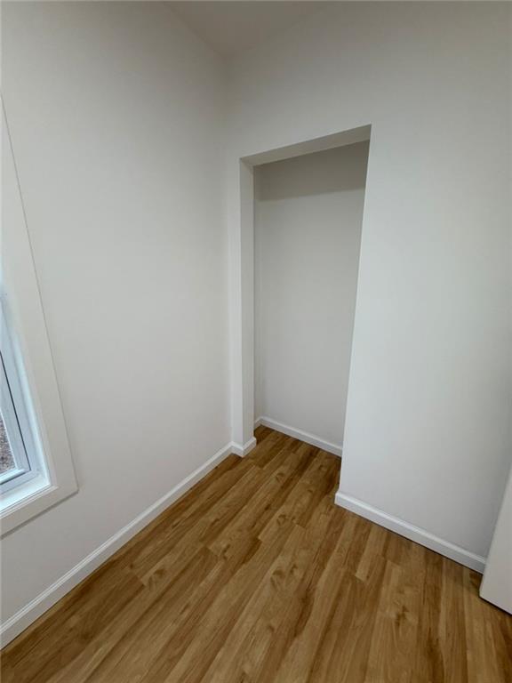 814 Oak Street Johnstown, PA 15902 - Photo 26 of 33 a view of an empty room with wooden floor and a window