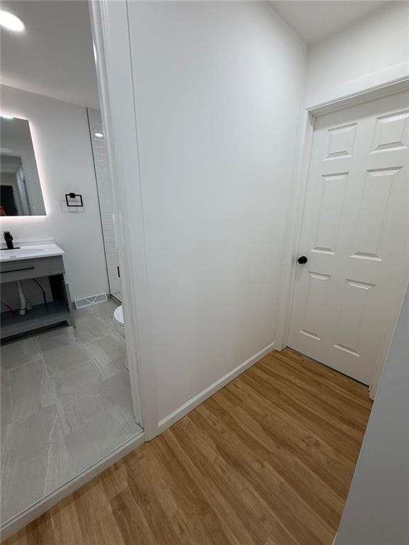 814 Oak Street Johnstown, PA 15902 - Photo 33 of 33 a view of a room with wooden floor and utility room