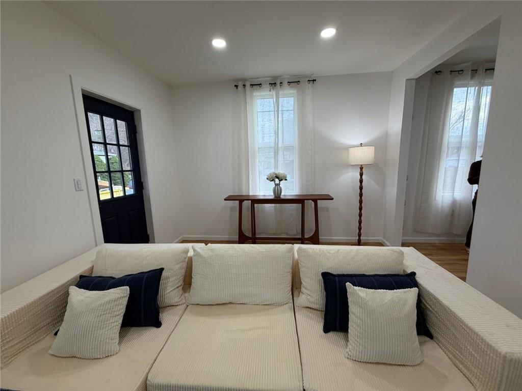 814 Oak Street Johnstown, PA 15902 - Photo 5 of 33 a large bedroom with a bed and wooden floor