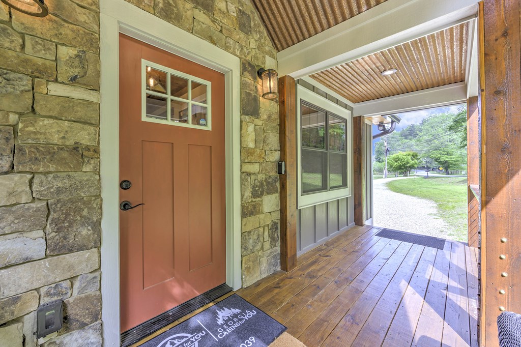 2263 Dial Road Blue Ridge, GA 30513 - Photo 7 of 53 a view of a house with a porch