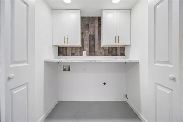 a view of cabinets and wooden floor