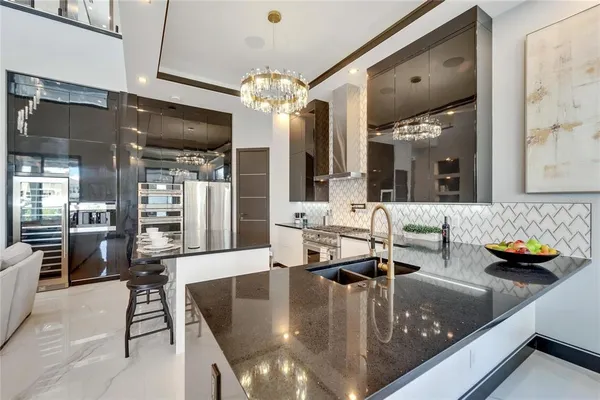 a bedroom with a large bed and a potted plant