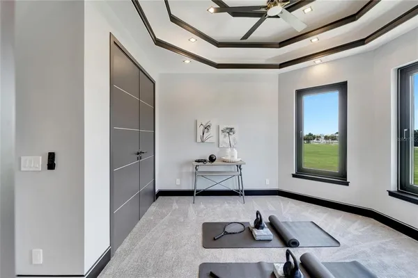 an aerial view of a house with outdoor space