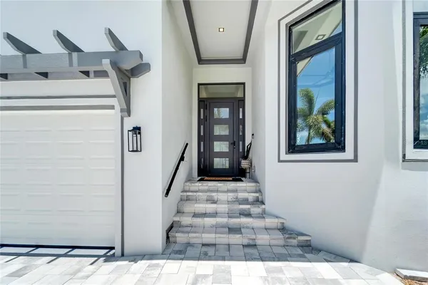 a view of living room with furniture and a flat screen tv