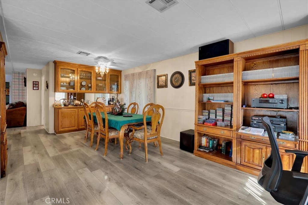 9800 Base Line Road, Unit 114 Rancho Cucamonga, CA 91701 - Photo 19 of 48 a living room with furniture and a flat screen tv