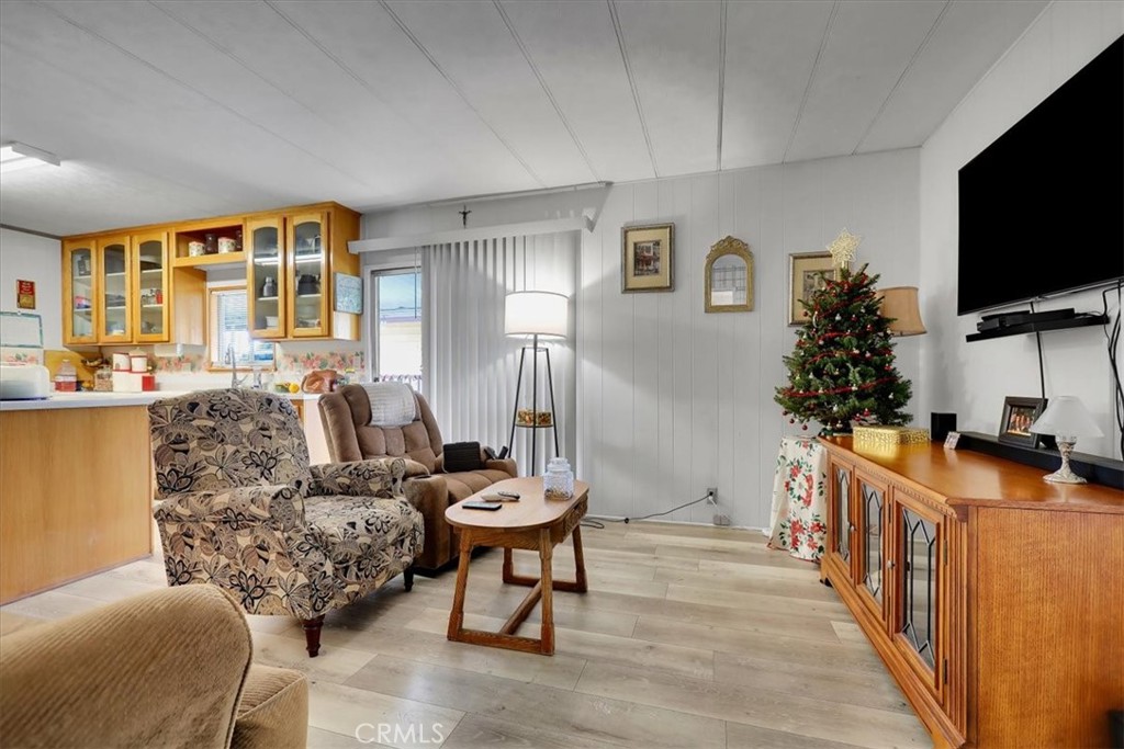 9800 Base Line Road, Unit 114 Rancho Cucamonga, CA 91701 - Photo 26 of 48 a living room with furniture and a flat screen tv