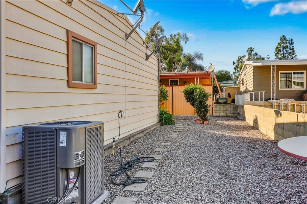 9800 Base Line Road, Unit 114 Rancho Cucamonga, CA 91701 - Photo 45 of 48 a front view of a house with garden
