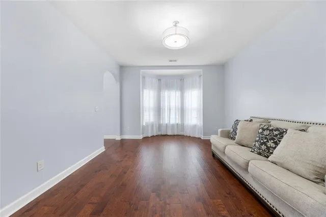 a view of livingroom and hardwood floor