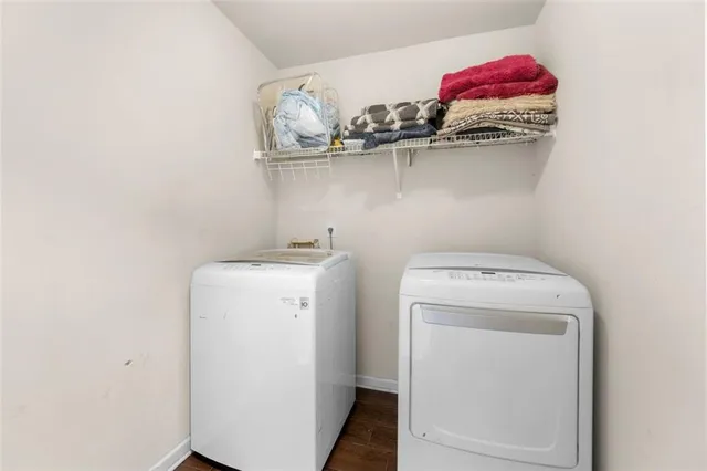 a utility room with dryer and washer