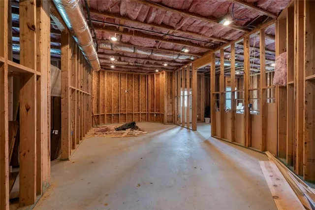 a view of a room with wooden walls