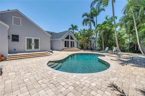 a view of outdoor space with swimming pool