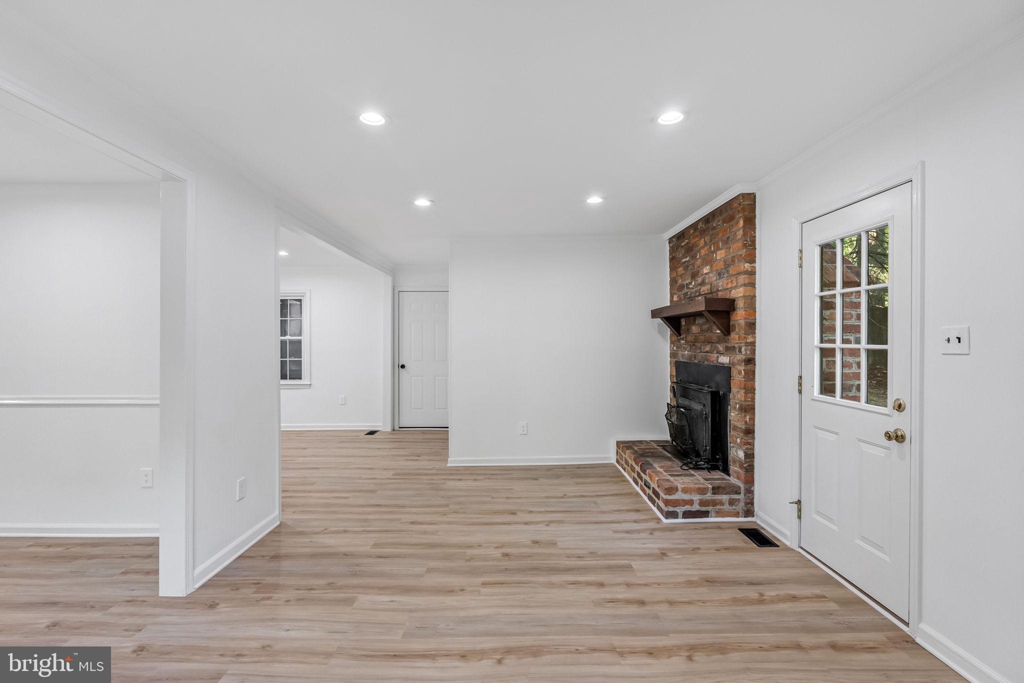 3 Boston Cove Ruther Glen, VA 22546 - Photo 11 of 30 a view of a livingroom with wooden floor and a refrigerator