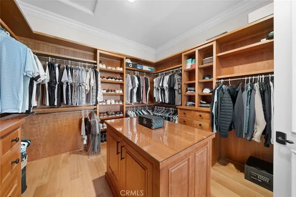 a big room with closet and mirror