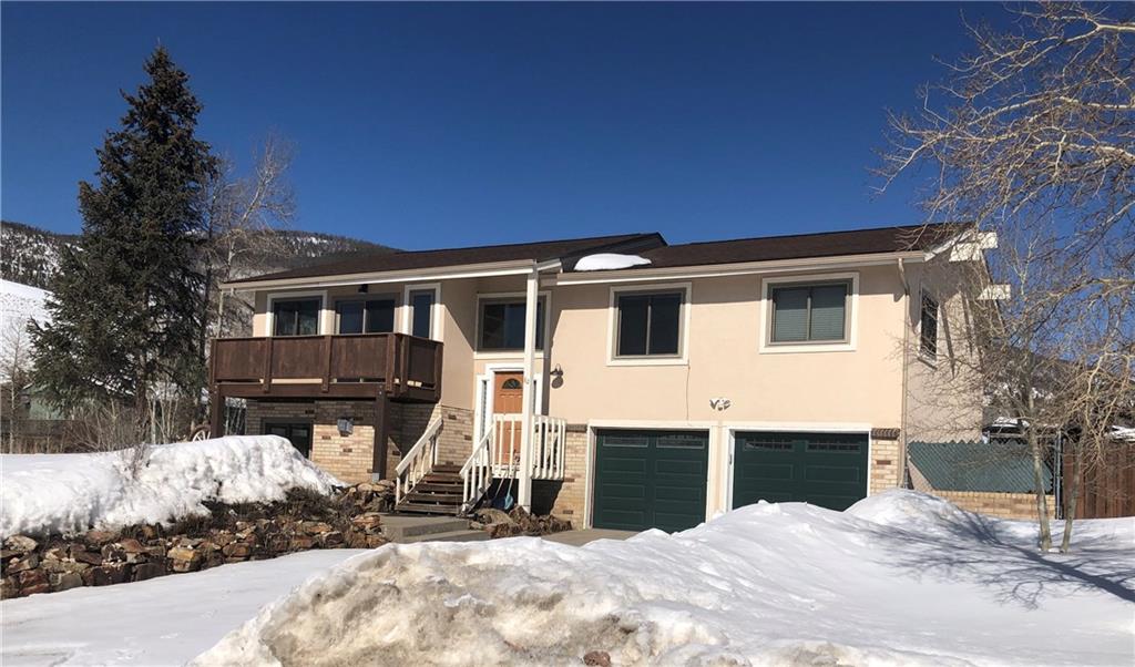 82 Canyon Trail Road Dillon, CO 80435 - Photo 2 of 31 a front view of a house with a yard
