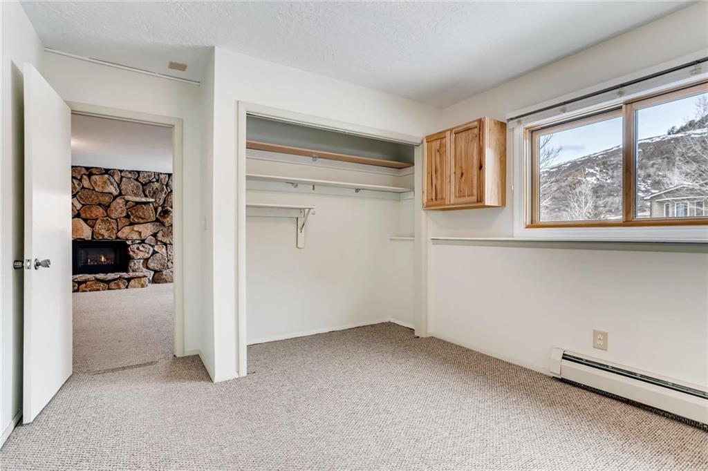 82 Canyon Trail Road Dillon, CO 80435 - Photo 13 of 31 an empty room with windows